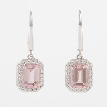 A pair of earrings with faceted morganite and round brilliant-cut diamonds.