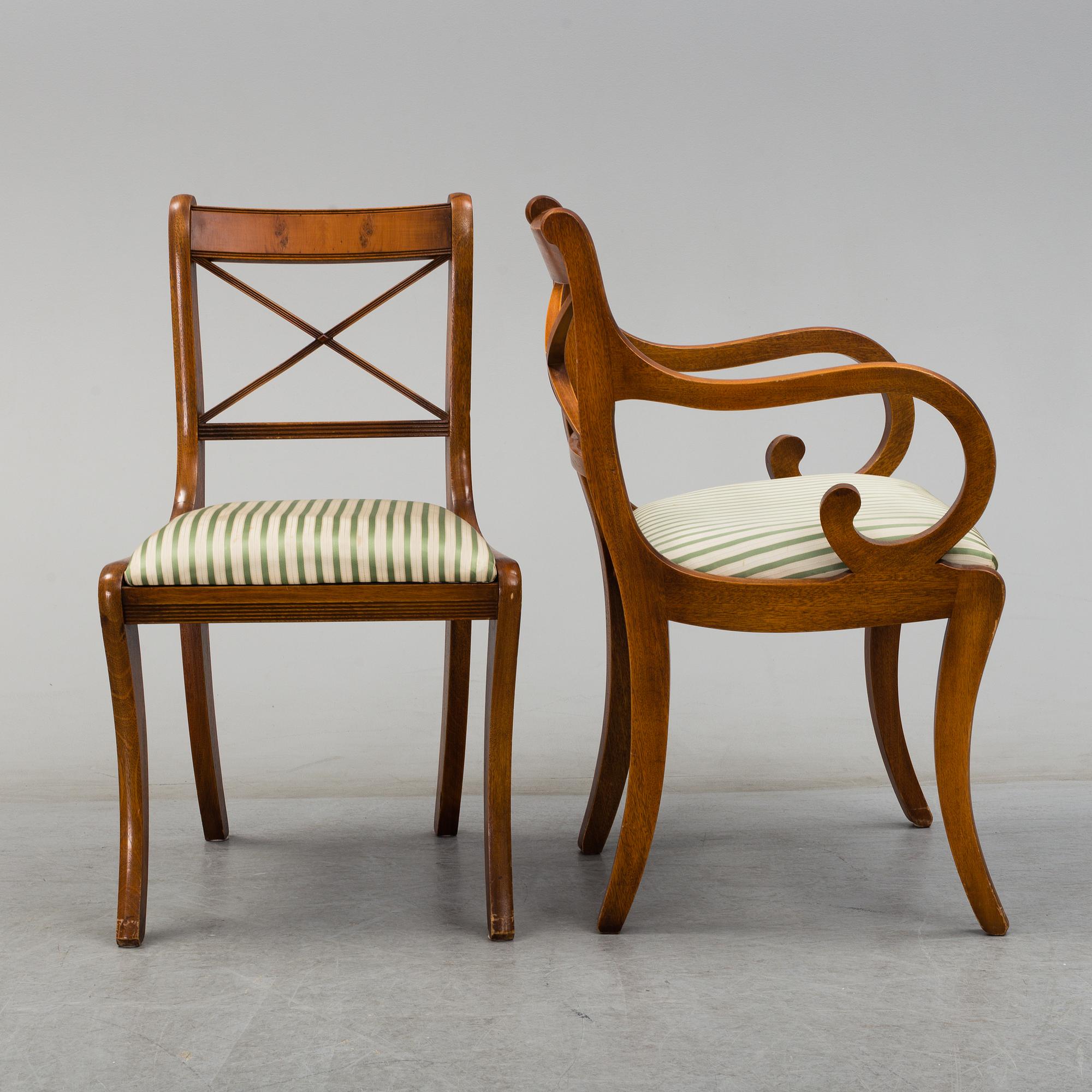 A late 20th century English style dining table and six chairs.