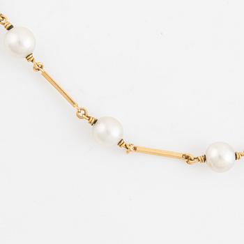 Collier, brosch samt ett par örhängen, guld samt pärlor.