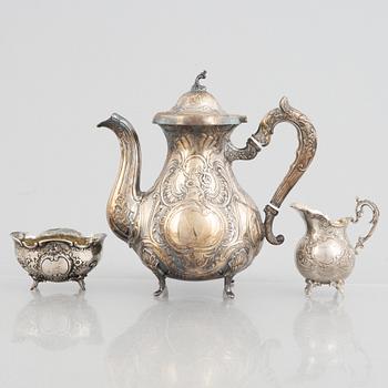 A silver coffee pot, creamer and sugar bowl, including GEWE, Malmö 1973. Rococo style.
