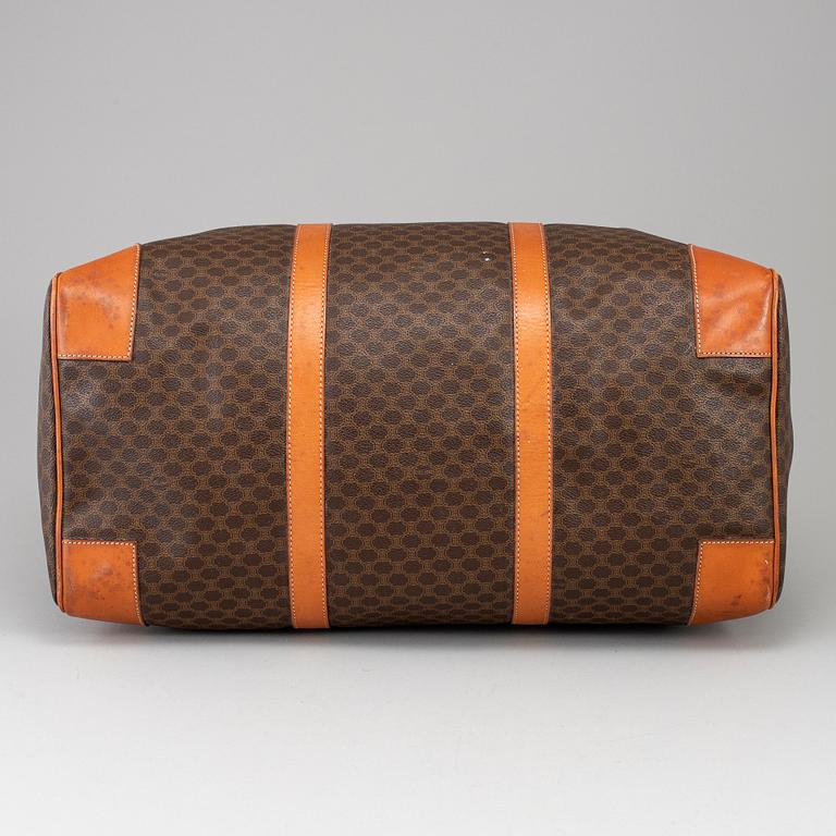 CÉLINE, a 'Macadam Duffle' bag.