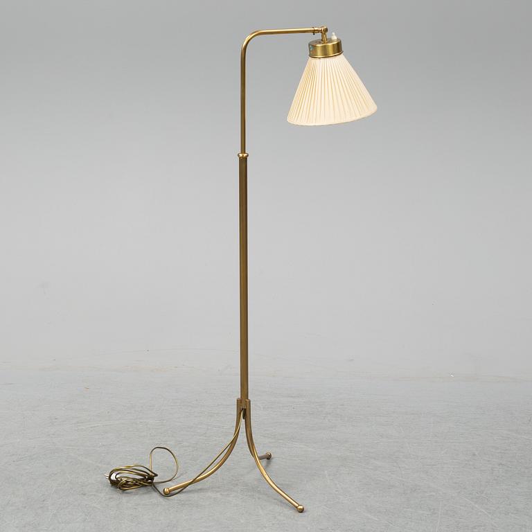 JOSEF FRANK, a model 1842 brass standard light from Svenskt Tenn.