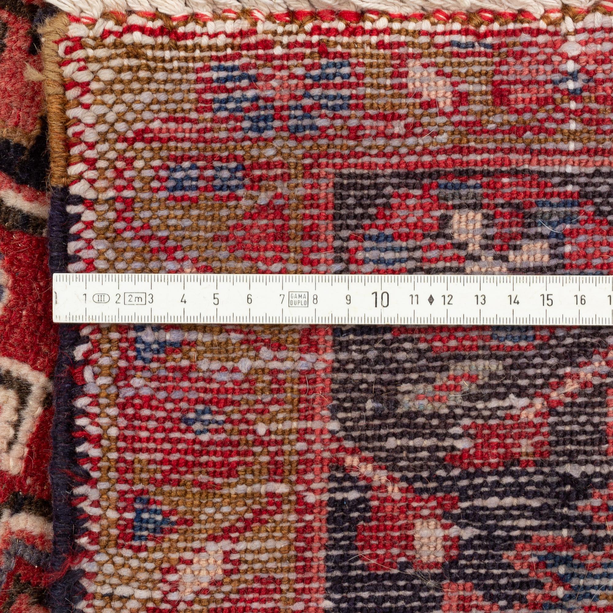 A carpet, circa 395 x 295 cm.