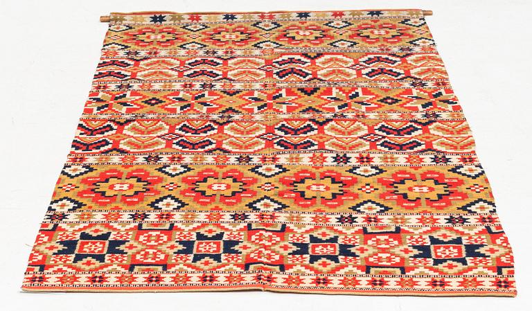 A double-interlocked tapestry bed cover, c. 189 x 112, northeastern Scania.