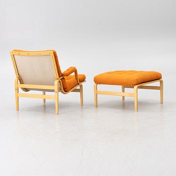 Bruno Mathsson, an 'Ingrid' armchair with ottoman, Dux.