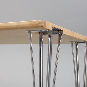 A birch and leather dining table produced by Mathsson International, 21th century.