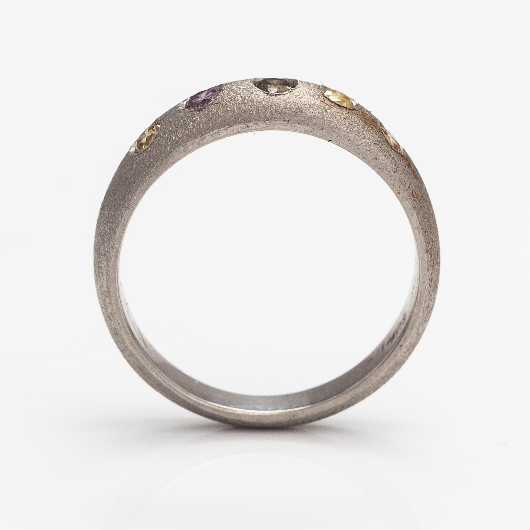 A palladium ring with diamonds ca. 0.25 ct in total.