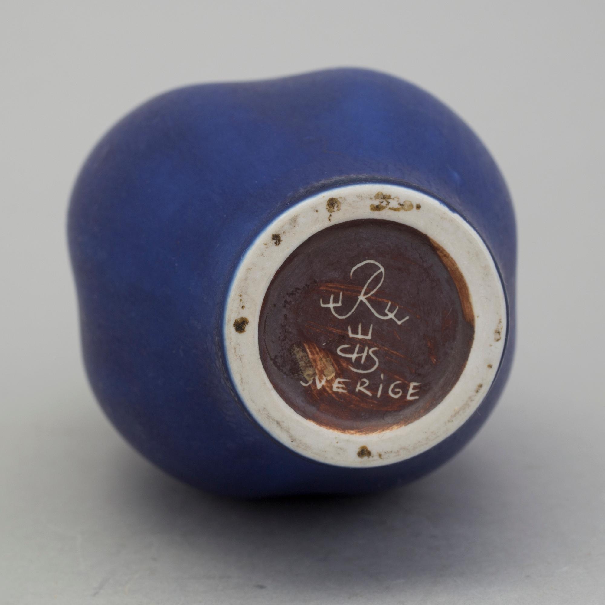 A blue vase by Carl Harry Stålhane for Rörstrand.