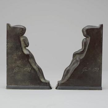 A pair of Axel Gute bronze book ends, 1922.