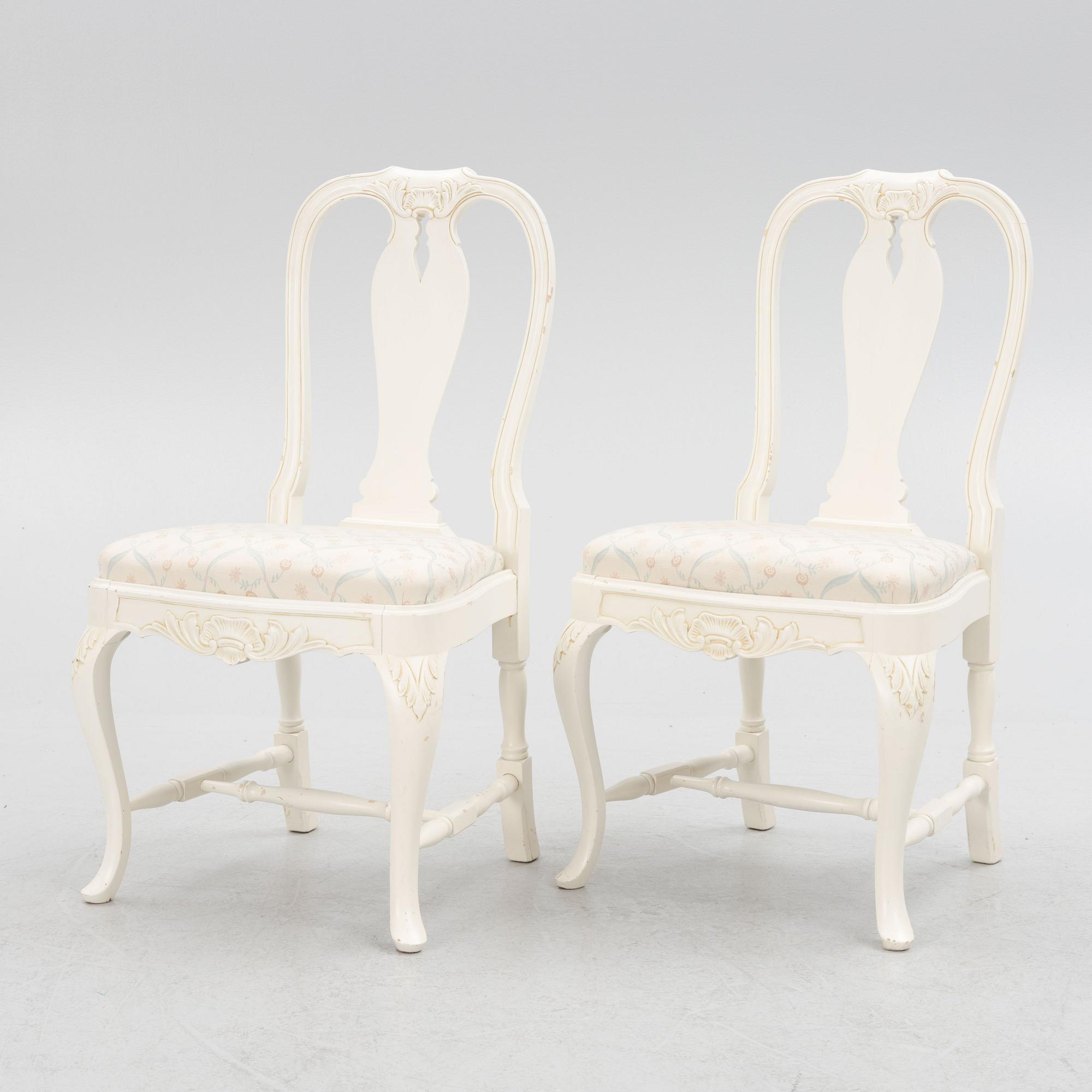 A Rococo style dining table with eight chairs, second half of the 20th century.