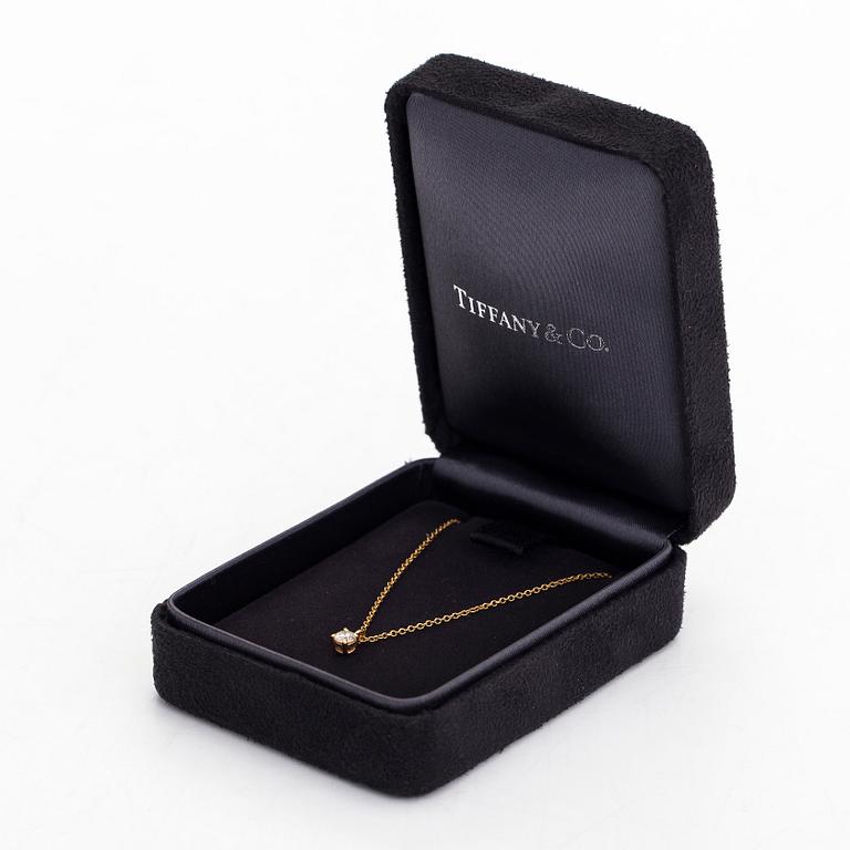 Tiffany & Co, an 18K gold necklace with a diamond ca. 0.17 ct.