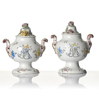 A pair of fainece potpurri jars with covers, Northern Europe, 18th century.