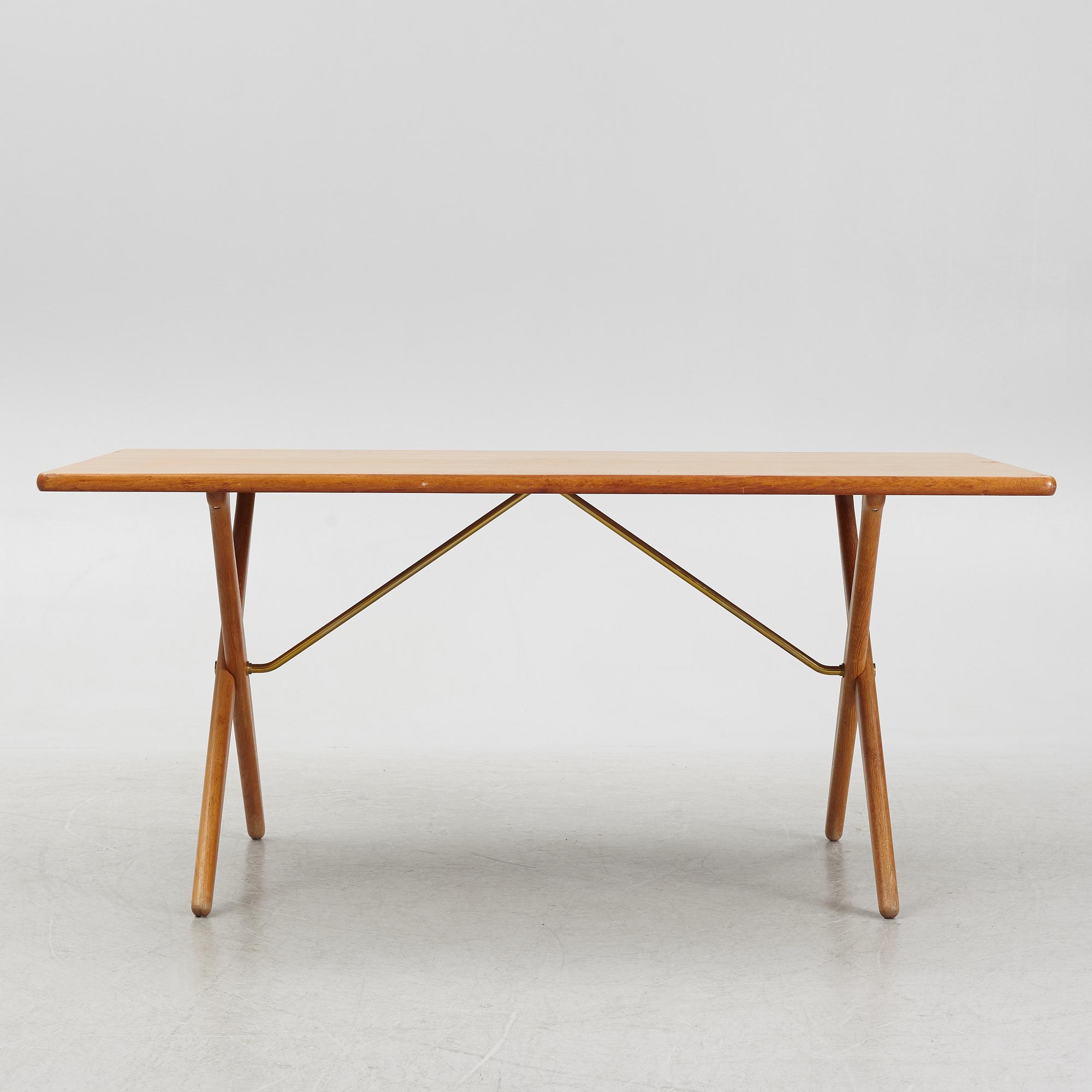 Hans J. Wegner, a 'Savbukkebordet AT 303' dining table, Andreas Tuck, Denmark.