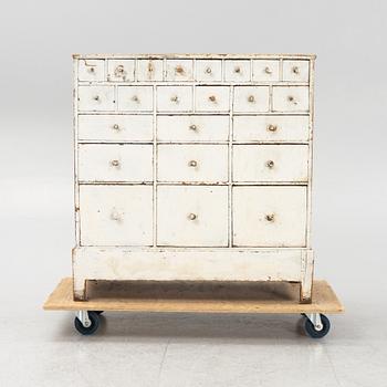 A painted chest of drawers, 20th Century.