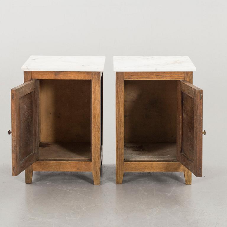 A PAIR OF BEDSIDE TABLES.