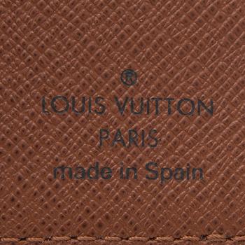 A Monogram Canvas Wallet / Card Holder.