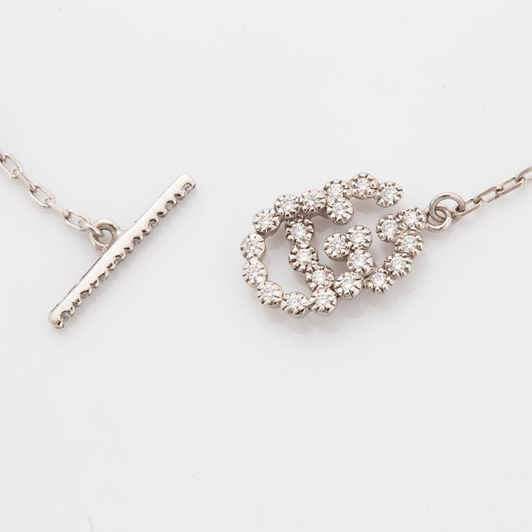 Gucci bracelet set with brilliant-cut diamonds.