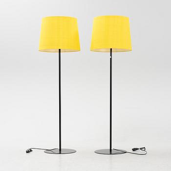 A pair of black metal floorlights, Luxus, Vittsjö.