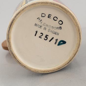 A set of five creamware jars with covers and a sugar caster,  including Anita Nylund, 'Vår lilla stad', Jie, Gantofta.