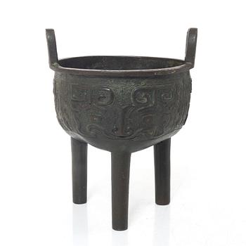 A Chinese tripod bronze censer, Ming style, Qing dynasty (1644-1912).
