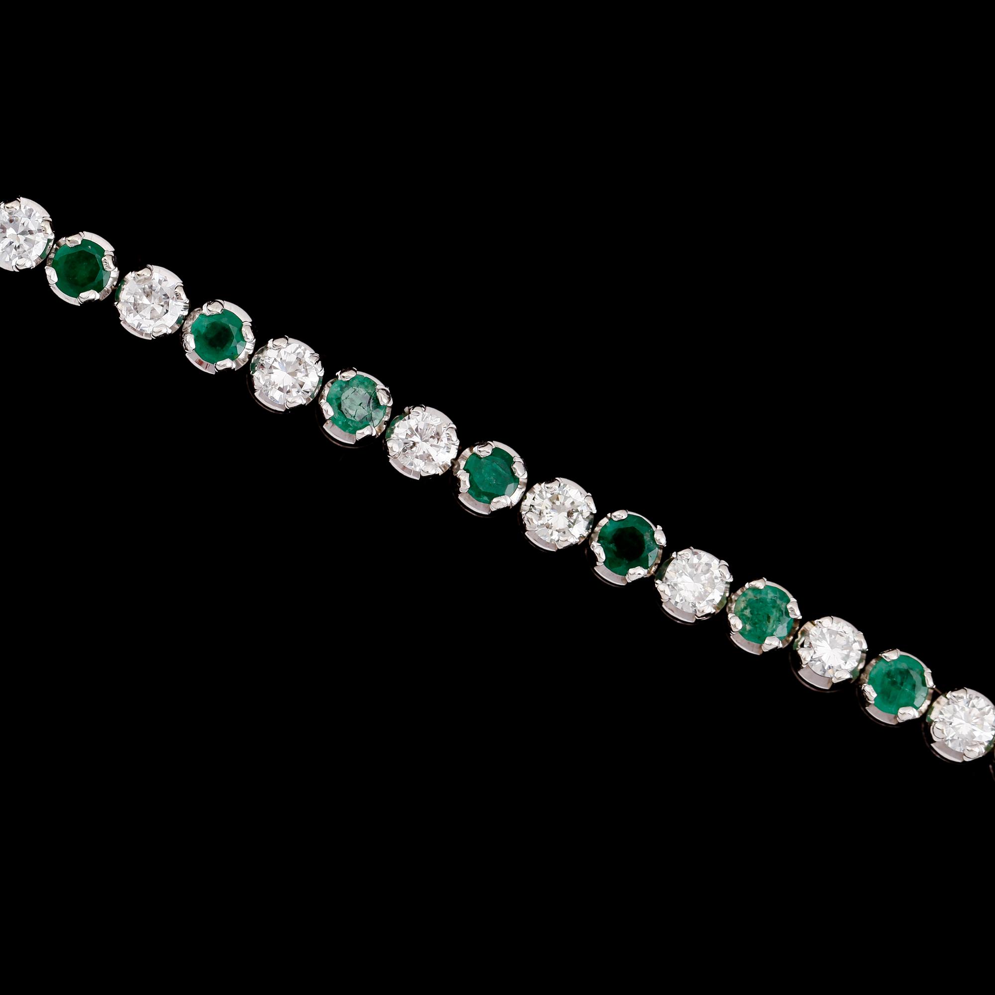ARMBAND, sk Rivière, 14 k vitguld, 21 briljantslipade diamanter tot ca 2.52 ct och smaragder. Vikt ca 13 g.