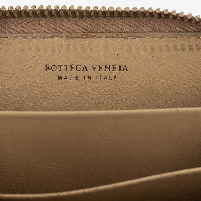 Bottega veneta, a inrecciato wallet and bracelet.