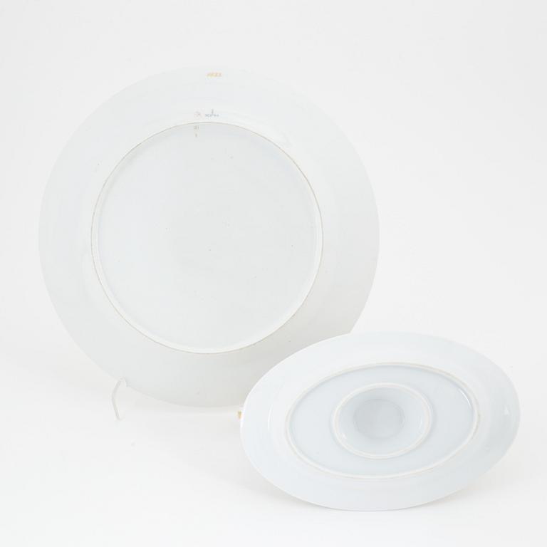 A porcelain sauce snipe and a dish, including KPM, Berlin, 19th/20th Century.