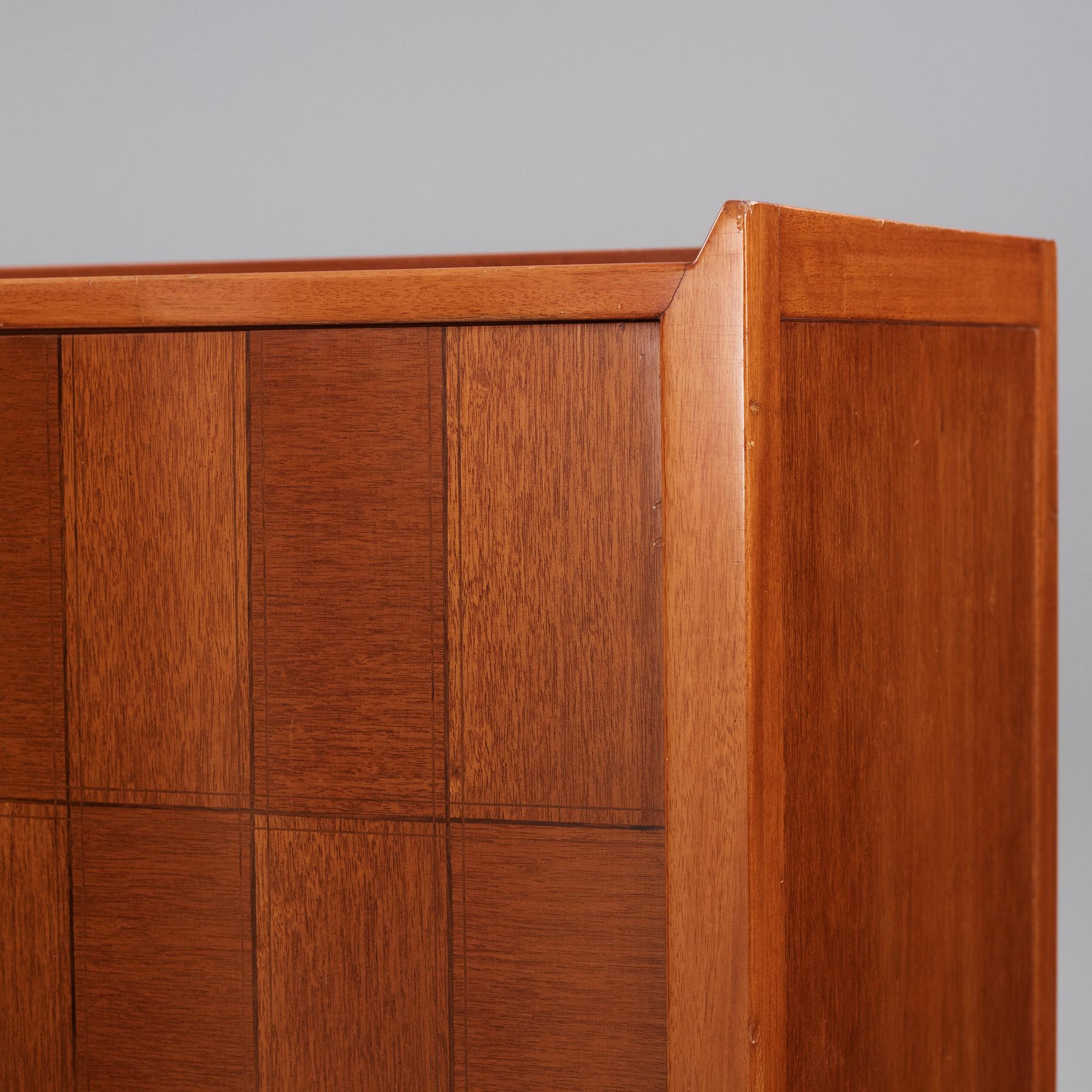 David Rosén, a mahogany and teak cabinet, for Stockholm's Association of Crafts, signed and dated 1959.