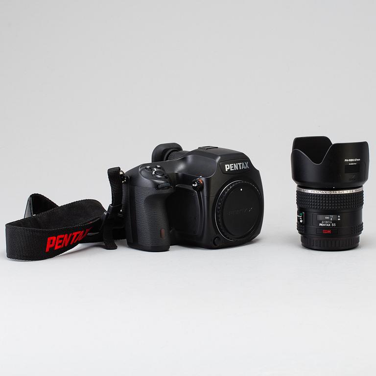A black body medium format Pentax 645D camera with a SMC Pentax-D FA 645 55mm F2.8 AL [IF] SDM AW lens.