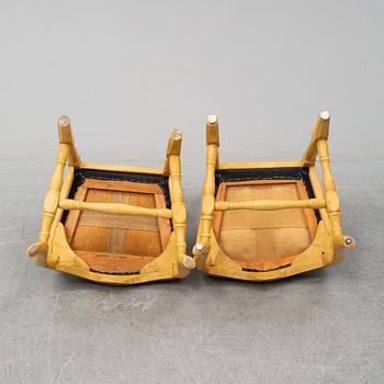 A mid 18th Century pair of rococo chairs.