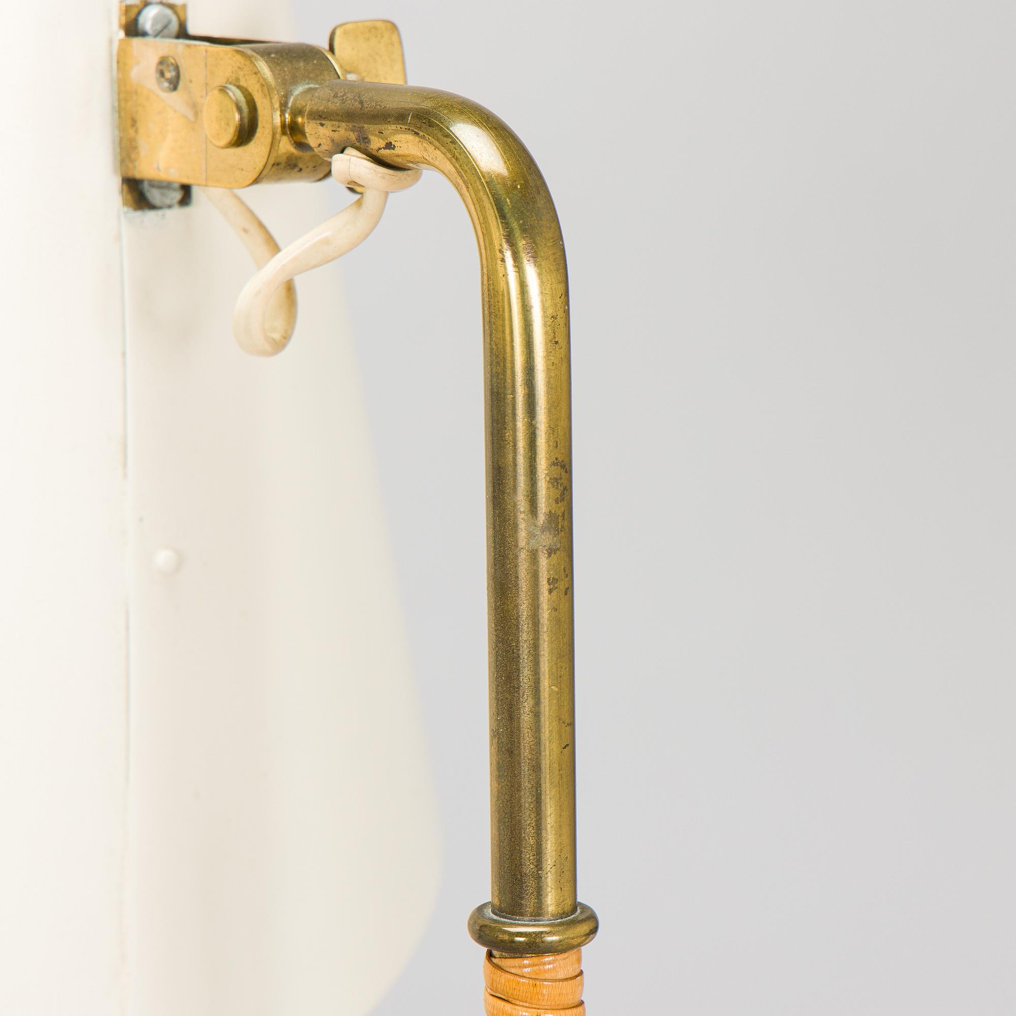 Paavo Tynell, a pair of mid-20th century K10-10 floor lamps for Taito Finland.
