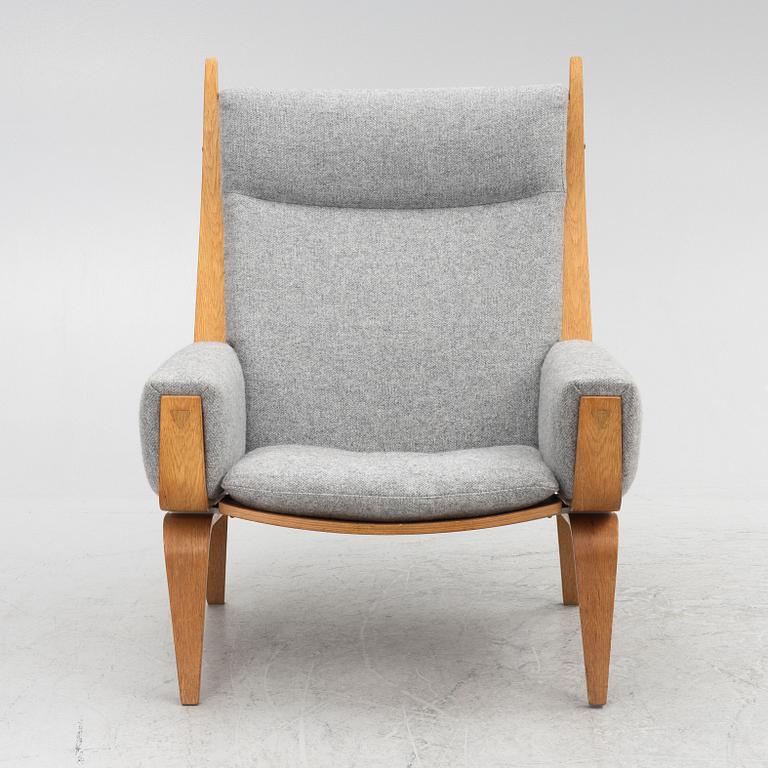 Hans J. Wegner, a model "GE 501-A" armchair, Getama, Denmark, 21st century.