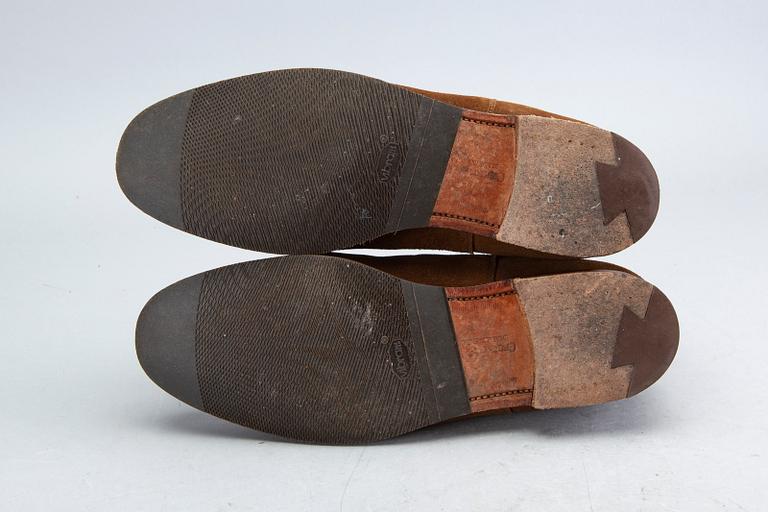 A pair of brown suede 'Gresham' Crockett & Jones boots.