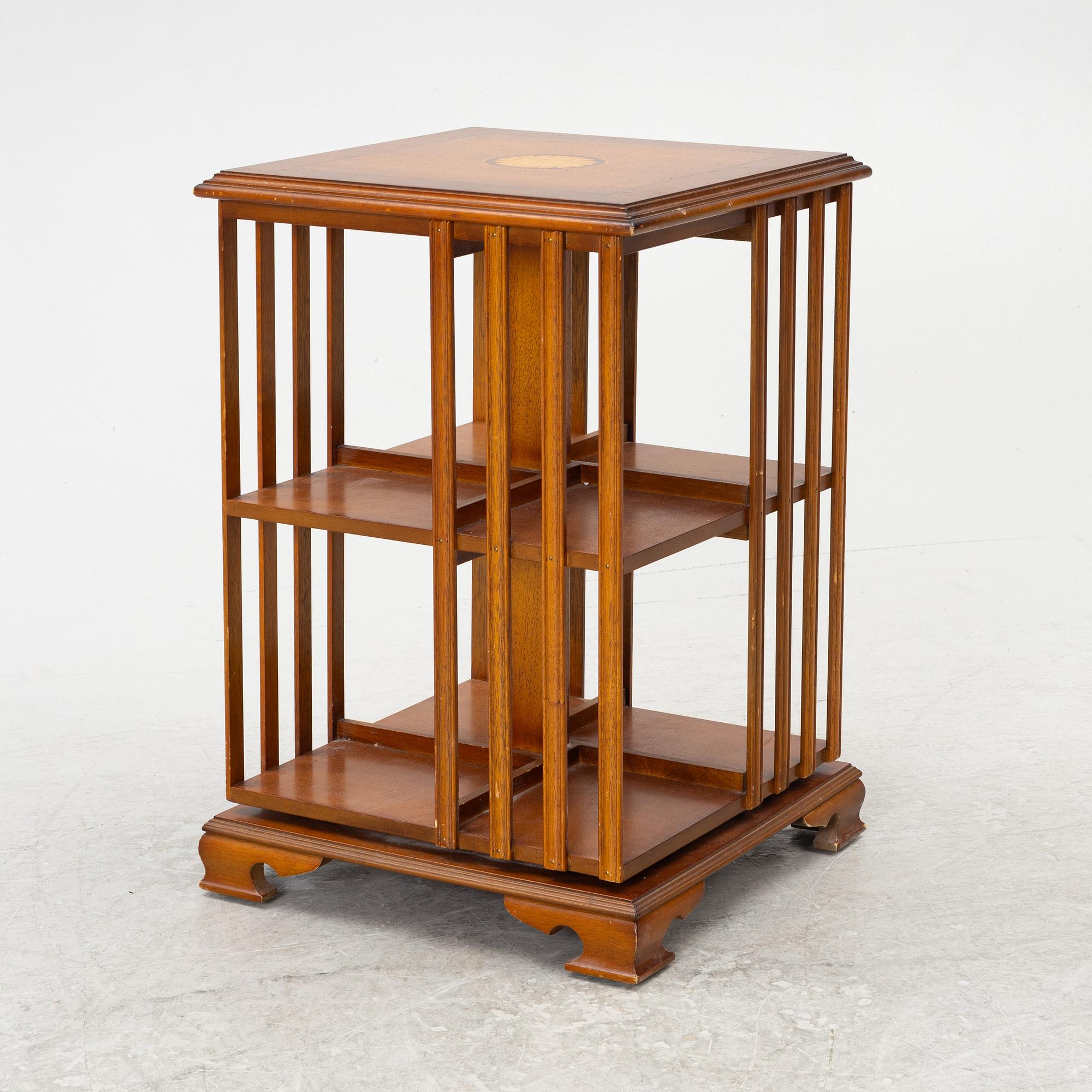 A revolving bookcase, late 20th century.