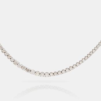 615. A line necklace with 104 brilliant cut diamonds total carat weight circa 25.44 cts. Quality circa G-H/VS-SI.