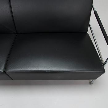 Gunilla Allard, a black leather 'Cinema' sofa from Lammhults.