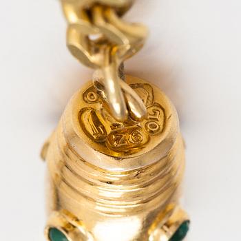 An 18K gold neckalce with stones. Erling Kaj Oy Ab, Helsinki 1977.