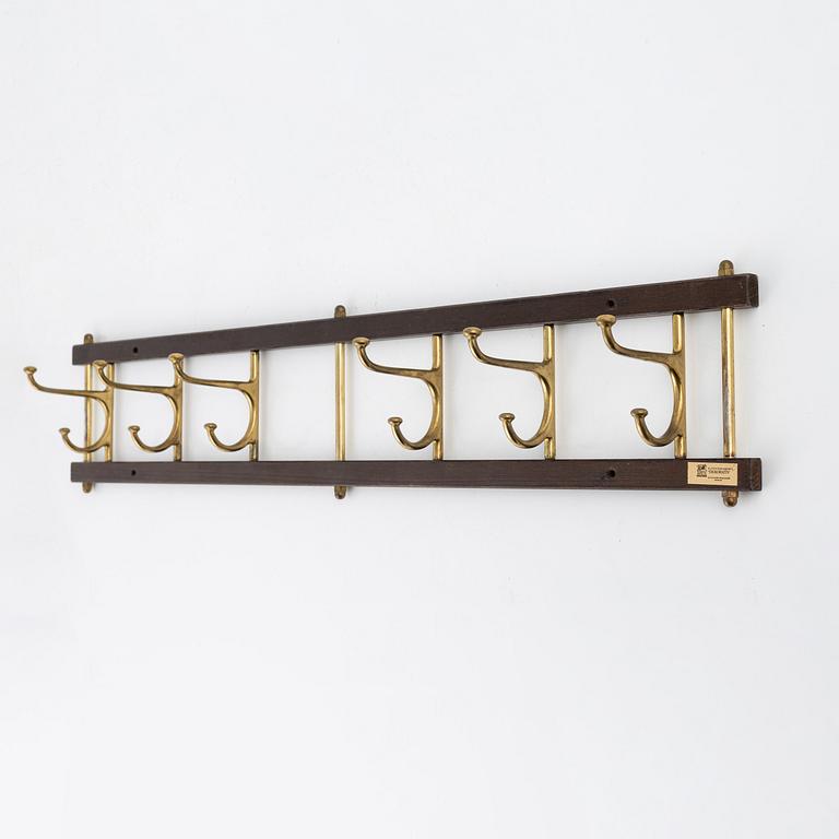 Klädhängare, "Dekorativ", Skogslunds metallgjuteri, Anderstorp, 1950/60-tal.