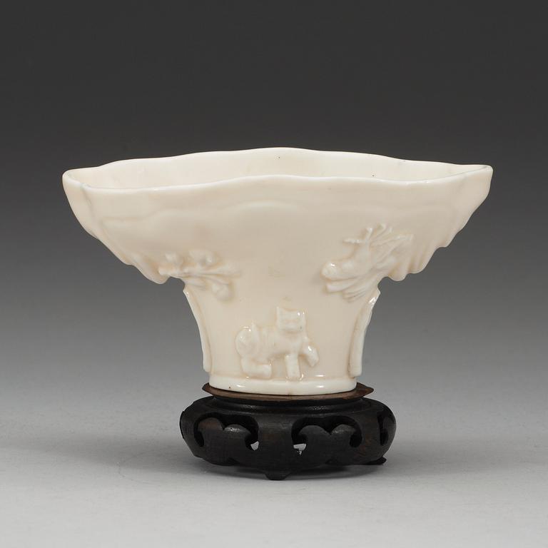 A blanc de chine libation cup, Qing dynasty.