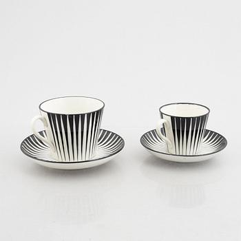 Eugen Trost, three creamware coffee cups with saucers and four tea cups with saucers, "Zebra", Upsala-Ekeby, Sweden.