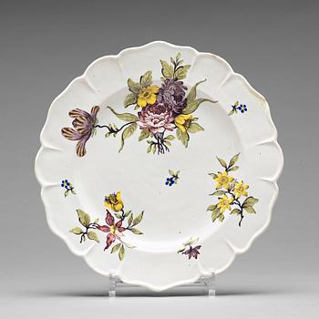 301. A set of nine faience Rörstrand plates, 18th Century.