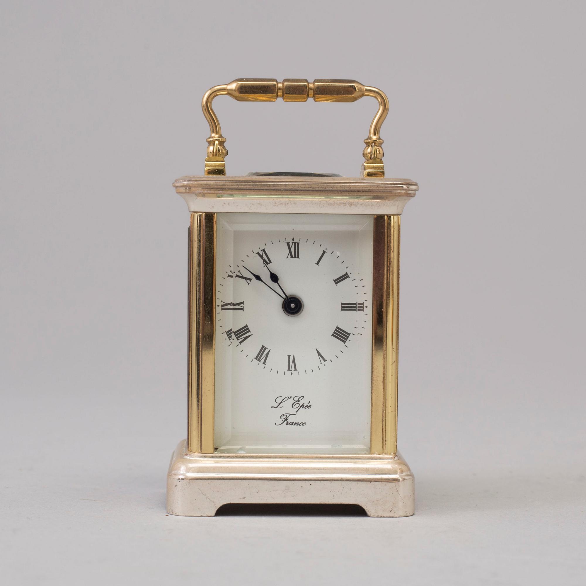 L´EPÉE, Fondée en 1839, travel alarm clock, lever escapement, second half of the 20th century.