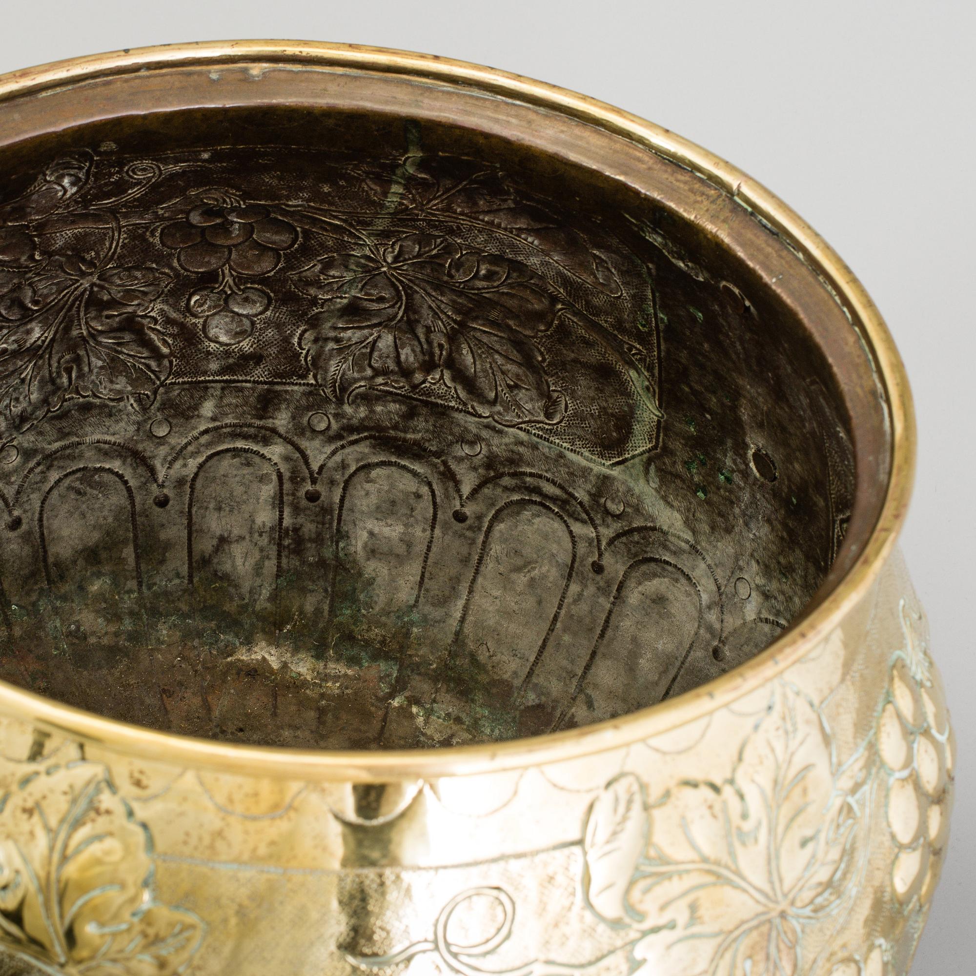 A 19th century brass flower pot.