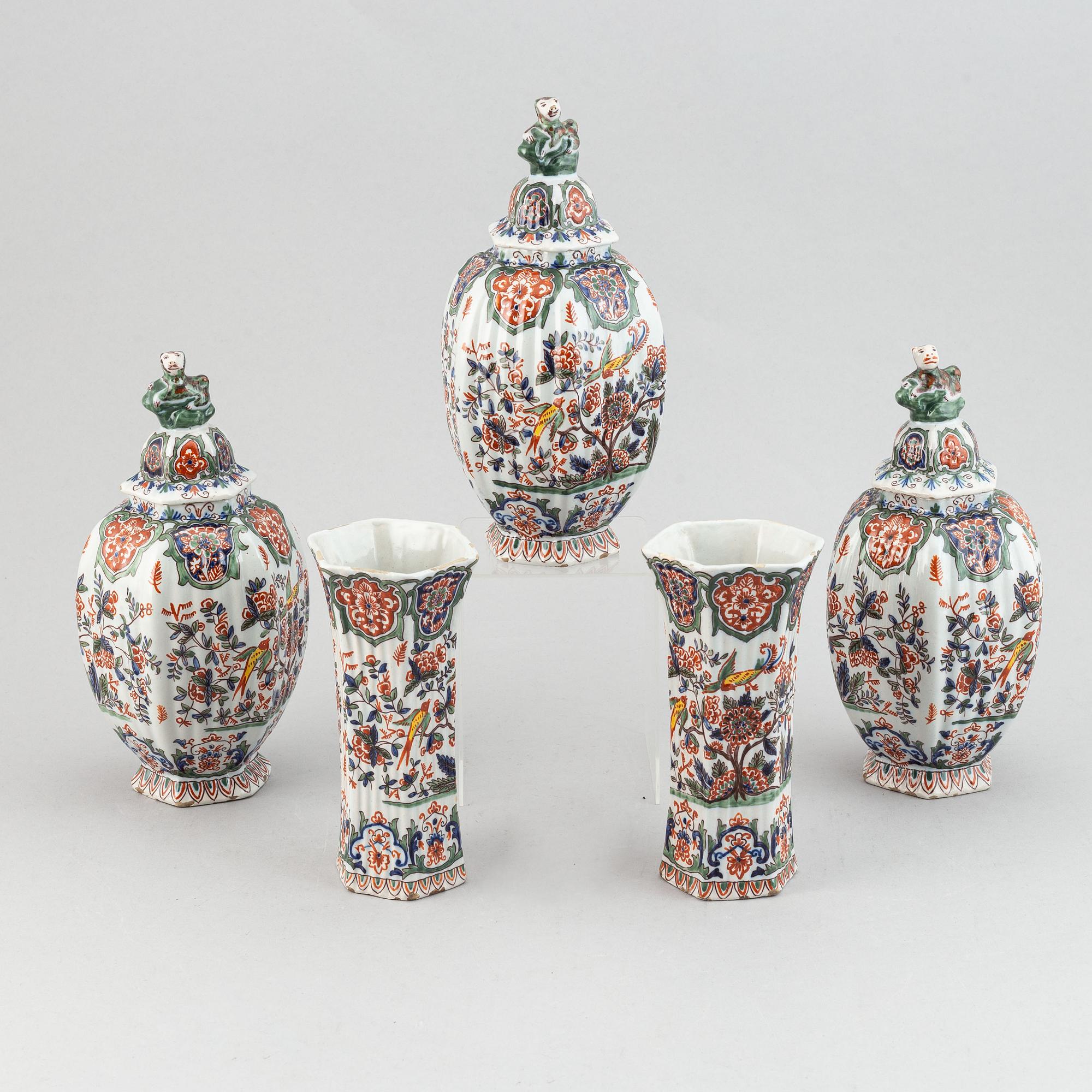 A five piece french faience garniture.