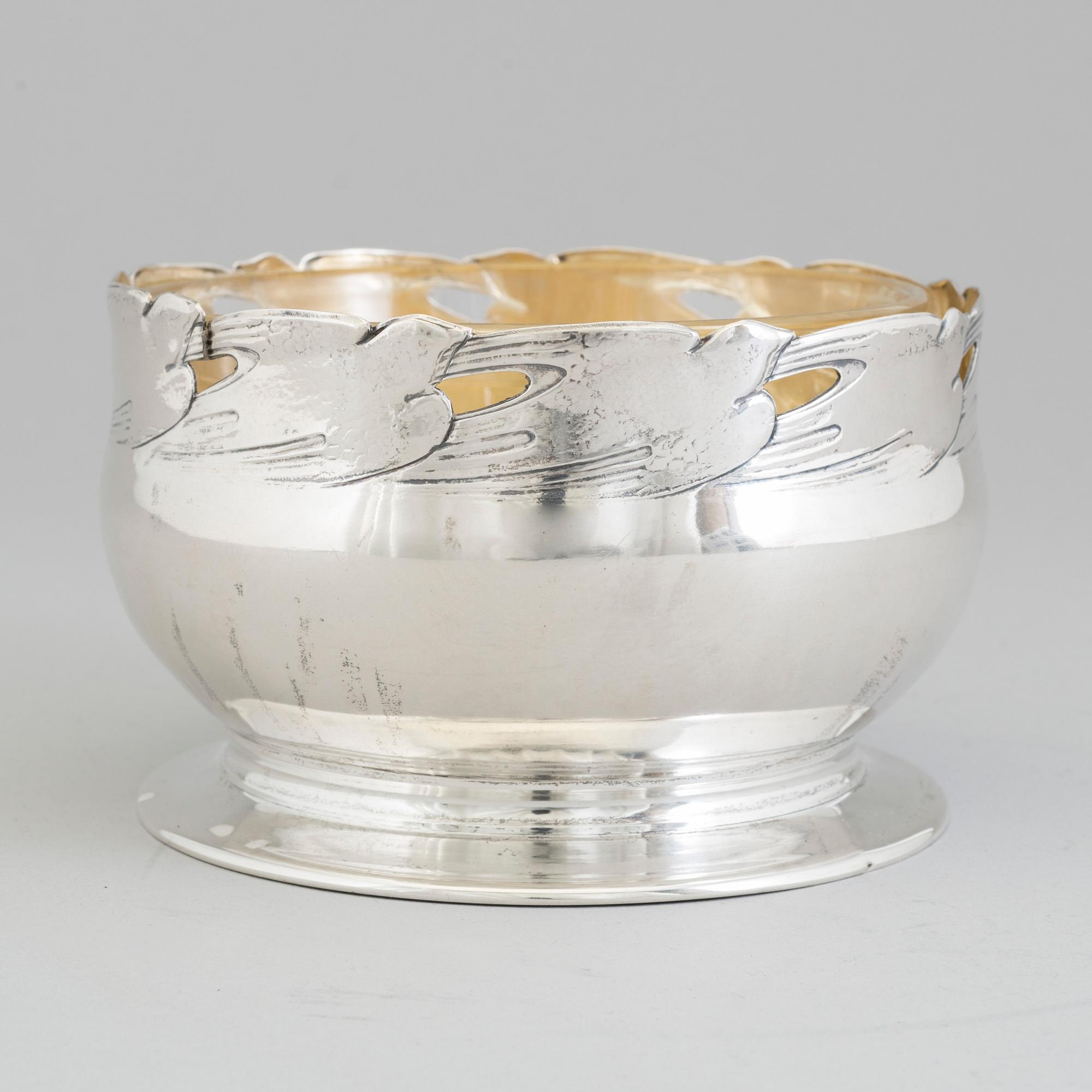A Swedish Art Nouveau parcel-gilt caviar bowl with later glass liner, mark of GAB, Stockholm, 1911.