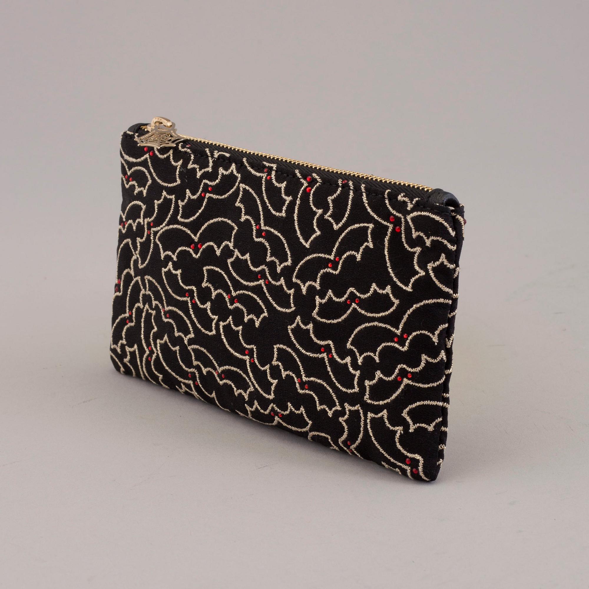 CLUTCH, Charlotte Olympia.