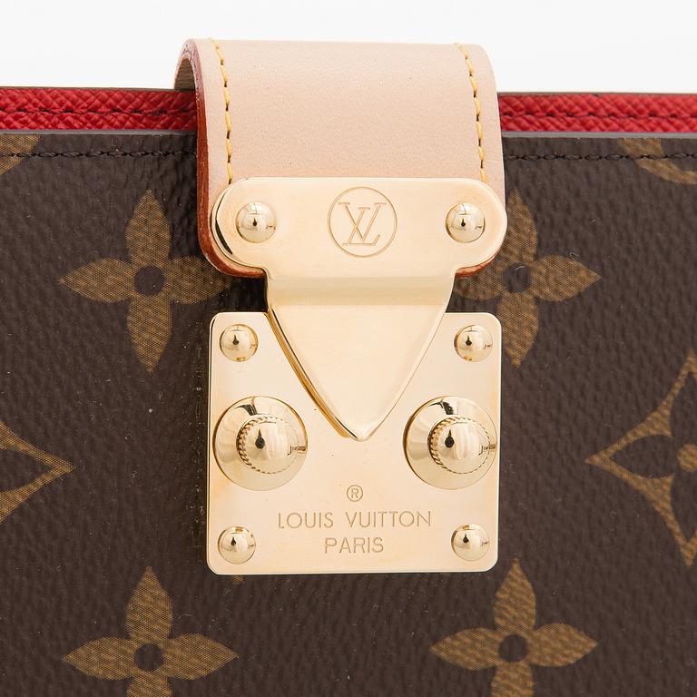 Louis Vuitton, A Monogram canvas Notebook cover 'Paul'.