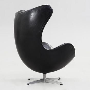 An Arne Jacobsen black leather 'Egg' chair, Fritz Hansen, Denmark 1960's.