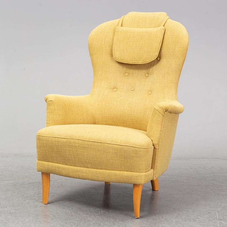 A Carl Malmsten ' farmor' chair.