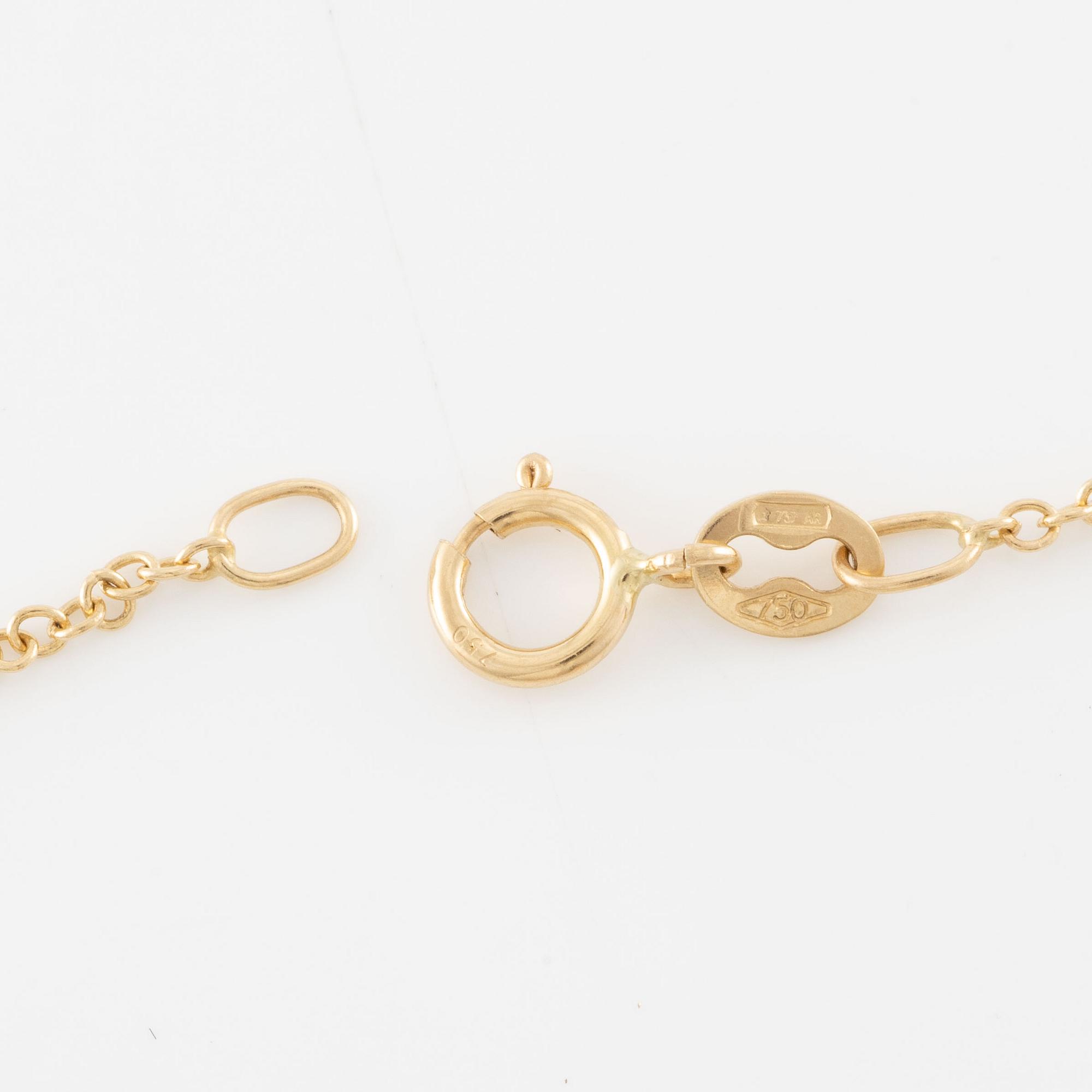 Necklace 18K gold with ruby and brilliant-cut diamonds.